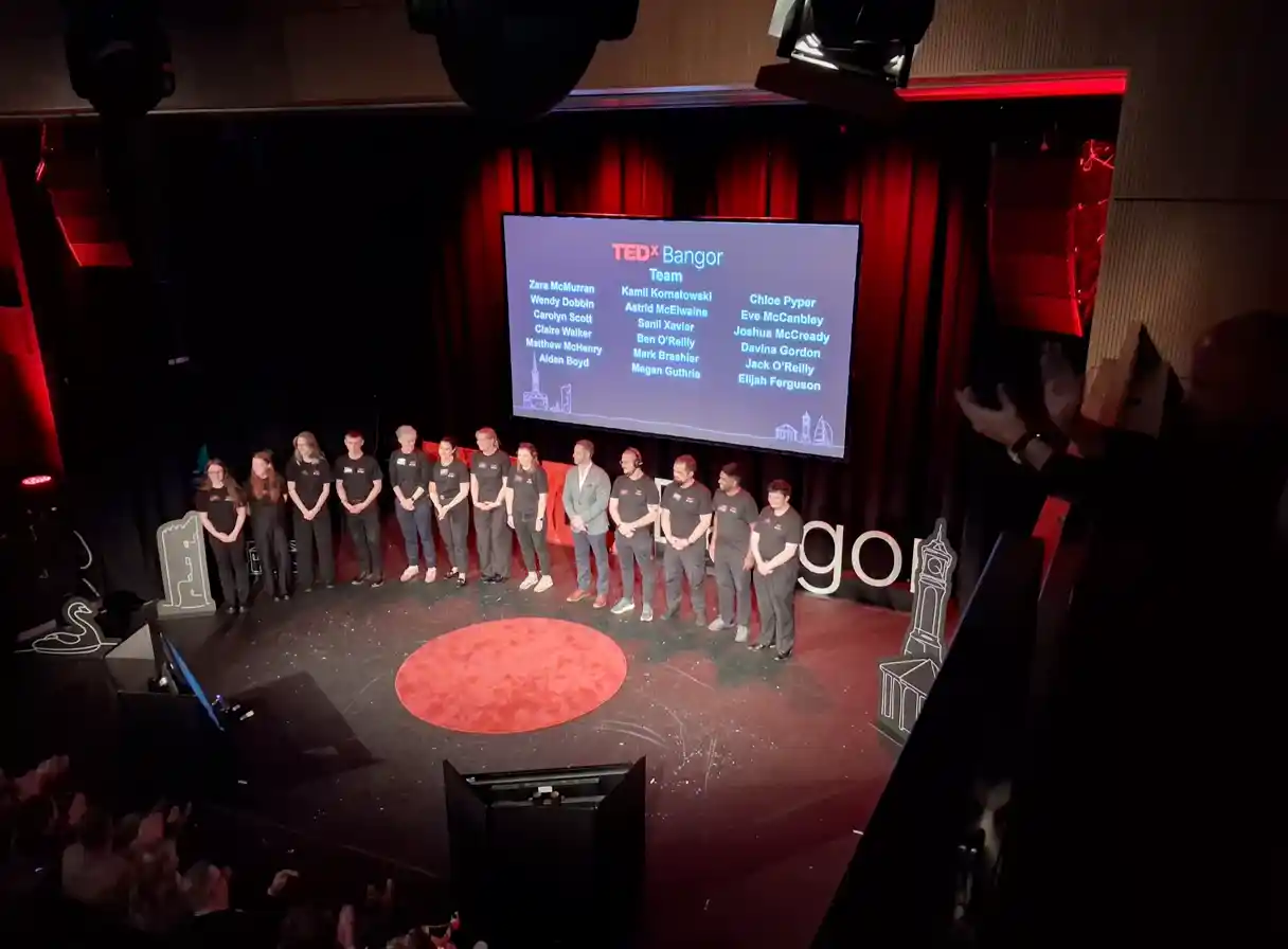 TEDx Bangor team on stage at the event